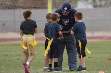 Kraliçe Arizona'da bayrak futbol oyun aksiyon oyunu ile oynadı.