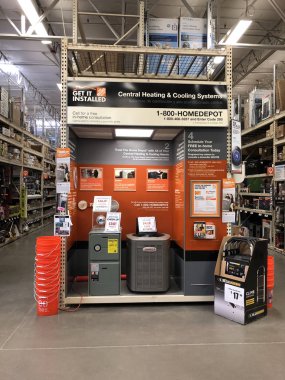 Home Depot en büyük ev geliştirme perakendeci Amerika Birleşik Devletleri olduğunu. Merkezi Isıtma ve soğutma sistemleri ekranda görüntülemek müşteriler için Home Depot mağaza içinde. Fotoğraf Güney Batı bölümünde yer alan Gilbert Arizona bize çekildi.