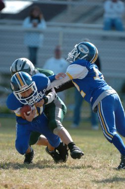 Warner Gençlik futbol eylem pop. Pop Warner Birleşik Devletler futbol oyun arkadaşları içinde en büyük ve en eski genç futbol ligi olduğunu.