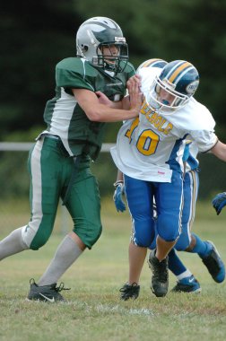  Warner Gençlik futbol eylem pop. Pop Warner Birleşik Devletler futbol oyun arkadaşları içinde en büyük ve en eski genç futbol ligi olduğunu.