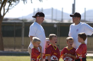Oyun aksiyon ve sahip eğlenceli çocuklar tarafından oynanan futbol oyun bayrak. Bayrak futbol bir bayrak alınır bir Amerikan futbolu oyunun temel kuralları futbol çözmek için benzer nerede ama oyuncular yere mücadele yerine sürümüdür.