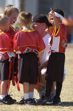 Oyun aksiyon ve sahip eğlenceli çocuklar tarafından oynanan futbol oyun bayrak. Bayrak futbol bir bayrak alınır bir Amerikan futbolu oyunun temel kuralları futbol çözmek için benzer nerede ama oyuncular yere mücadele yerine sürümüdür.
