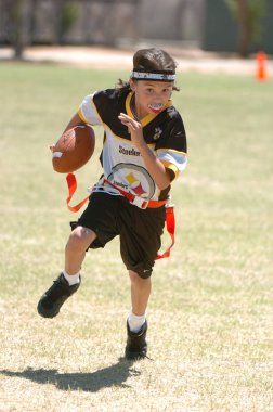 Oyun aksiyon ve sahip eğlenceli çocuklar tarafından oynanan futbol oyun bayrak. Bayrak futbol bir bayrak alınır bir Amerikan futbolu oyunun temel kuralları futbol çözmek için benzer nerede ama oyuncular yere mücadele yerine sürümüdür.