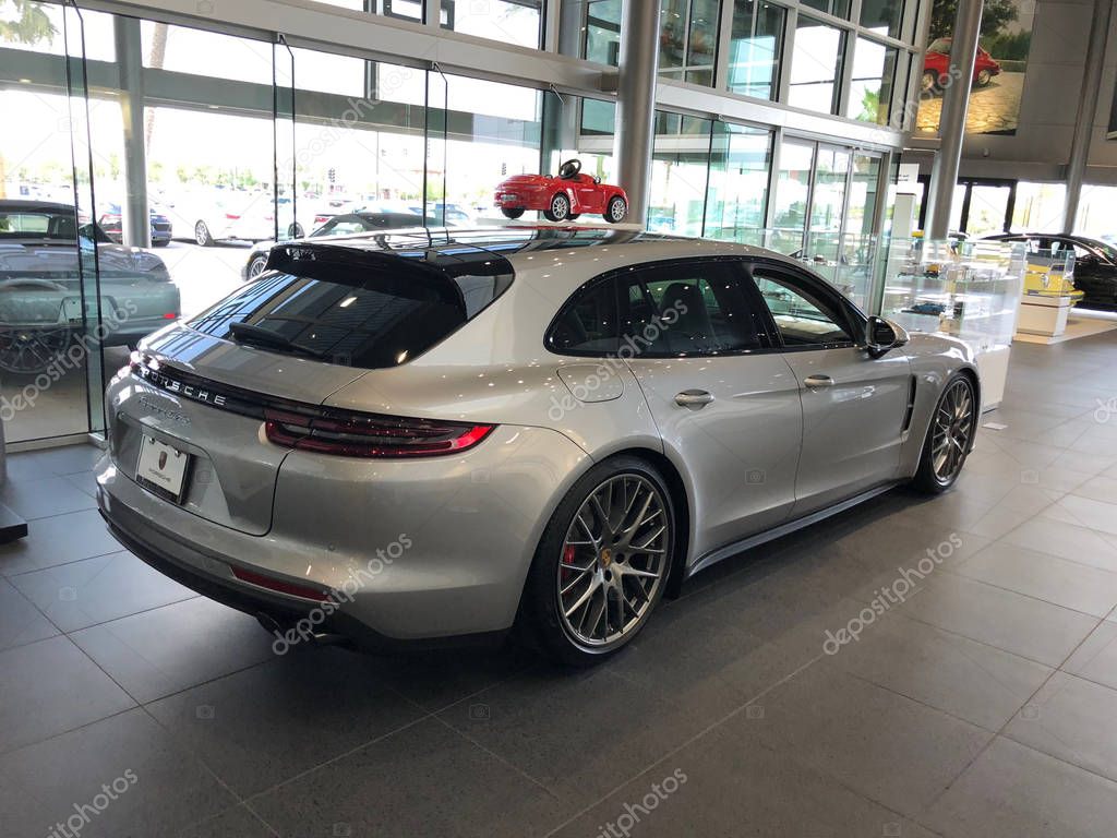 New Porsche car dealership selling cars in a Gilbert Arizona location in the Southwest part of the United States. Porsche AG is a German automobile manufacturer specializing in high-performance sports cars and SUVs.