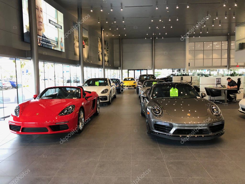 New Porsche car dealership selling cars in a Gilbert Arizona location in the Southwest part of the United States. Porsche AG is a German automobile manufacturer specializing in high-performance sports cars and SUVs.