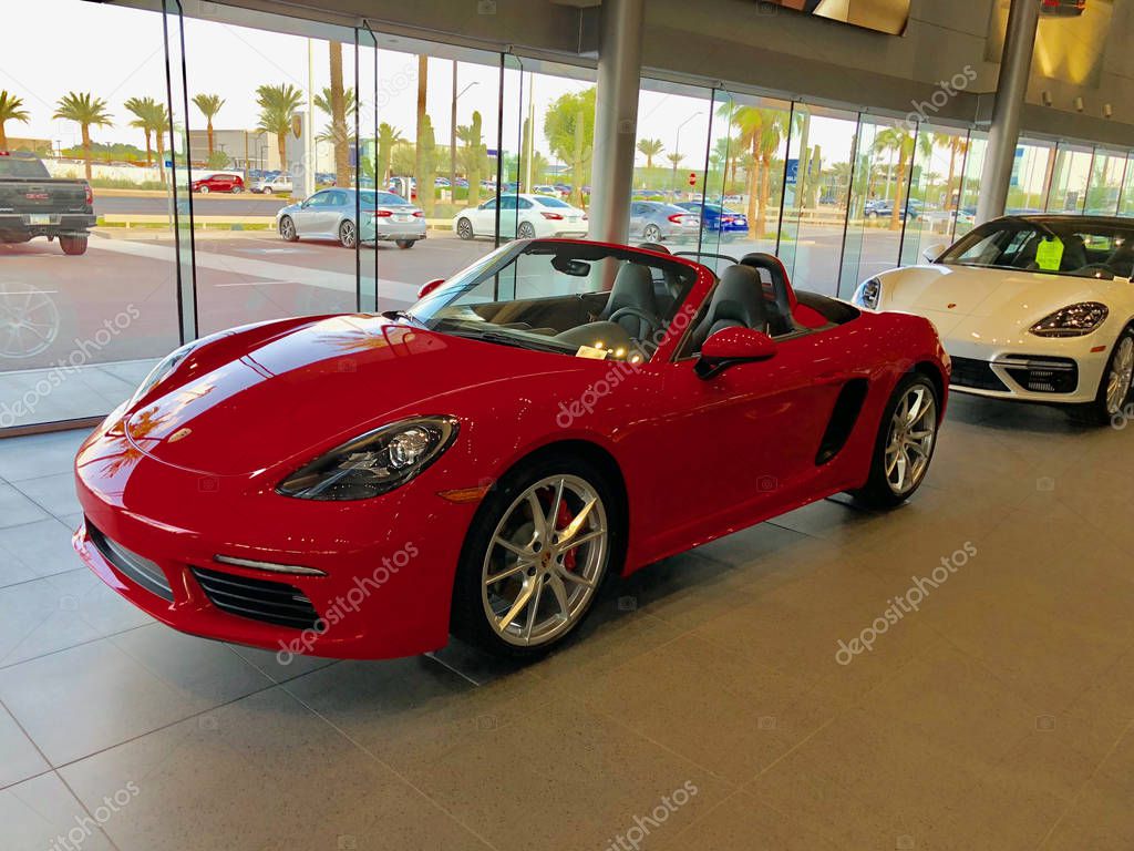 New Porsche car dealership selling cars in a Gilbert Arizona location in the Southwest part of the United States. Porsche AG is a German automobile manufacturer specializing in high-performance sports cars and SUVs.