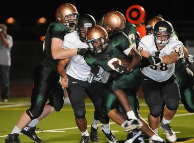 Arizona Doğu Vadisi oynanan bir normal sezon oyunları sırasında lise futbol oyun eylem. Yüksek okul futbol lise takım Amerika Birleşik Devletleri'nde oynadığı ızgara futbolcu.