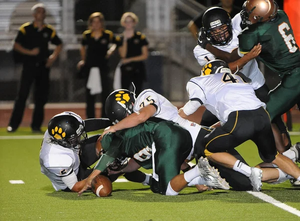 Arizona Doğu Vadisi oynanan bir normal sezon oyunları sırasında lise futbol oyun eylem. Yüksek okul futbol lise takım Amerika Birleşik Devletleri'nde oynadığı ızgara futbolcu.