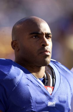 Tiki Kuaför koşucu, New York Giants normal sezon Nfl oyun sırasında oyun eylem için. Tiki Kuaför bir eski Nfl futbol Ulusal Futbol Ligi için New York Giants için 10 sezon boyunca oynadığı koşucu olduğunu. 