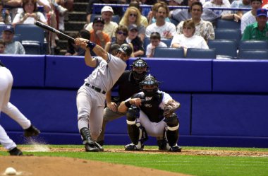 New York Yankees normal sezon oyun sırasında oyun eylem için Jorge Posada avcısı. Jorge Posada için New York Yankees Major League Baseball 17 sezon oynayan bir Porto Rikolu eski profesyonel beyzbol alıcı olduğunu.