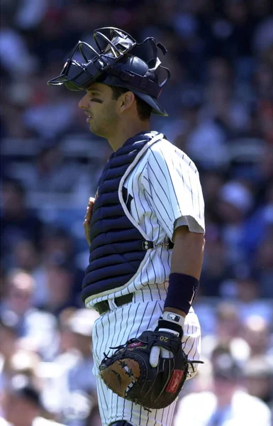 为纽约洋基队在一个常规赛季比赛中的比赛行动 波萨达是一个波多黎各前职业棒球捕手谁打了17赛季在大联盟棒球为纽约洋基队 — 图库照片