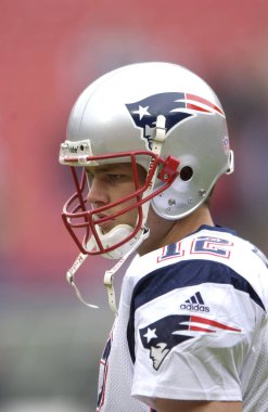 Tom Brady Quarterback Nfl sezonu sırasında oyun eylem New England Patriots için. Tom Brady New England Patriots Ulusal Futbol Ligi için bir Nfl futbol oyun kurucu olduğunu. Beş Super kase kazanmak için sadece iki oyuncu biri.
