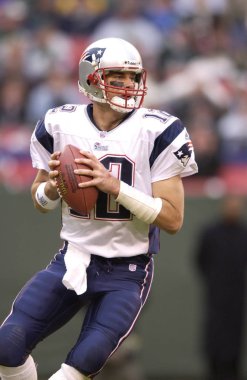 Tom Brady Quarterback Nfl sezonu sırasında oyun eylem New England Patriots için. Tom Brady New England Patriots Ulusal Futbol Ligi için bir Nfl futbol oyun kurucu olduğunu. Beş Super kase kazanmak için sadece iki oyuncu biri.