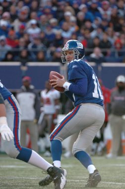 Eli Manning oyun kurucu için New York Giants normal sezon Nfl oyun sırasında oyun eylem. Eli Manning gelecek sezon için Super Bowl oyun kurucu için New York dev kazanan bir iki dönemdir.