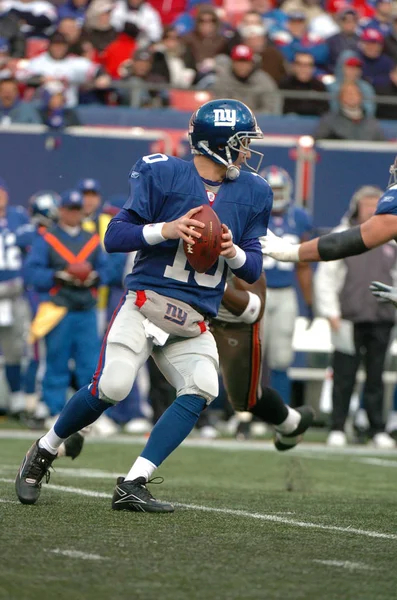 Eli Manning oyun kurucu için New York Giants normal sezon Nfl oyun sırasında oyun eylem. Eli Manning gelecek sezon için Super Bowl oyun kurucu için New York dev kazanan bir iki dönemdir.