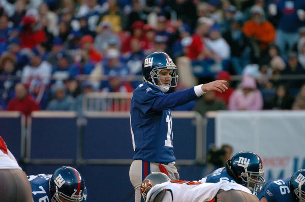 Eli Manning oyun kurucu için New York Giants normal sezon Nfl oyun sırasında oyun eylem. Eli Manning gelecek sezon için Super Bowl oyun kurucu için New York dev kazanan bir iki dönemdir.