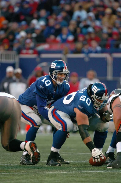 Eli Manning oyun kurucu için New York Giants normal sezon Nfl oyun sırasında oyun eylem. Eli Manning gelecek sezon için Super Bowl oyun kurucu için New York dev kazanan bir iki dönemdir.