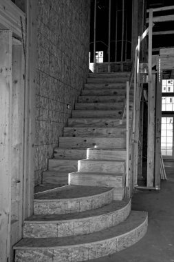 Yeni inşaat çerçeveleme işçiler tarafından istihdam edilmektedir inşaat şirketinden bir ekibi tarafından monte ediliyor. Bu evler Amerika Birleşik Devletleri'nin güneybatı parçası olan Arizona inşa ediliyor.