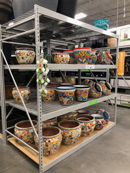 At Home is a big box retail network specializing in home decor products .The specialty retailer 's stores each carry over 50,000 unique items across broad product categories. Магазин находится в Меса, Аризона
.