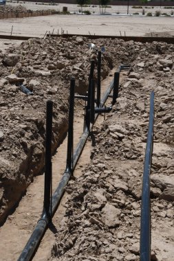 Yeni inşaat işçileri tarafından istihdam edilmektedir inşaat şirketinden bir ekibi tarafından monte ediliyor. Bu evler Amerika Birleşik Devletleri'nin güneybatı parçası olan Arizona inşa ediliyor.