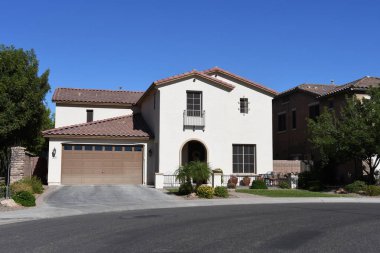 New modern luxury classic homes in Gilbert, Arizona. Gilbert is a town in Maricopa County, Arizona, United States, located southeast of Phoenix, within the Phoenix metropolitan area. clipart