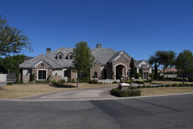 New modern luxury classic homes in Gilbert, Arizona. Gilbert is a town in Maricopa County, Arizona, United States, located southeast of Phoenix, within the Phoenix metropolitan area. clipart