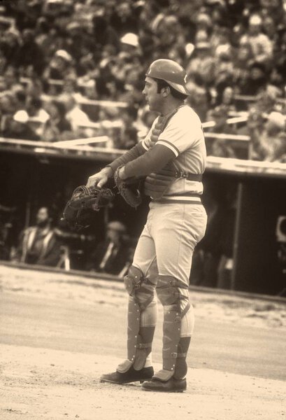 Johnny Bench Hall of Fame Catcher for the Cincinnati Reds at bat during a regular season game. Johnny Bench former baseball catcher who played in the Major Leagues for the Cincinnati Reds from 1967 to 1983.