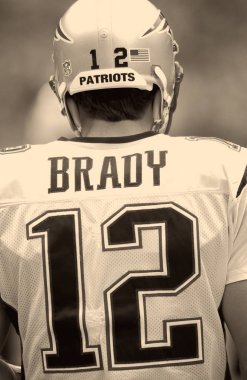 Tom Brady Quarterback Nfl sezonu sırasında oyun eylem New England Patriots için. Tom Brady New England Patriots Ulusal Futbol Ligi için bir Nfl futbol oyun kurucu olduğunu. Beş Super kase kazanmak için sadece iki oyuncu biri.