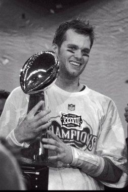 Tom Brady Quarterback Nfl sezonu sırasında oyun eylem New England Patriots için. Tom Brady New England Patriots Ulusal Futbol Ligi için bir Nfl futbol oyun kurucu olduğunu. Beş Super kase kazanmak için sadece iki oyuncu biri.