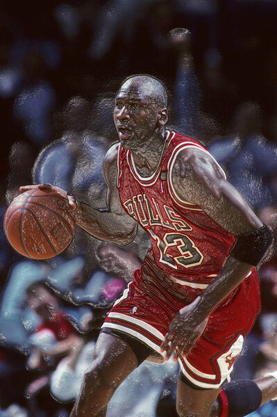 Michael Jordan Hall Of Fame player from the Chicago Bulls in game action in a regular NBA game. Michael Jordan is former professional basketball player. He played 15 seasons in the National Basketball League before retiring.