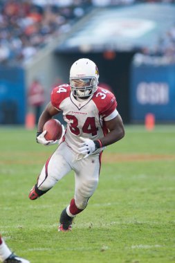Tim Hightower koşucu bir Nfl oyun sahasında aşağı ishal gibi bir büyük yarda olarak uzunluk kazanç için arıyorsunuz.
