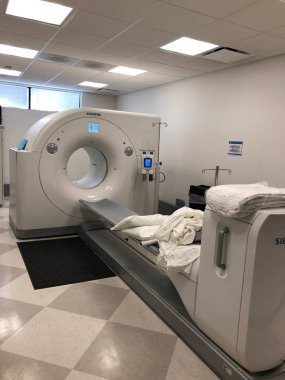  A magnetic resonance imaging (MRI) scan is a common procedure around the world. MRI uses a strong magnetic field and radio waves to create detailed images of the organs and tissues within the body. . clipart
