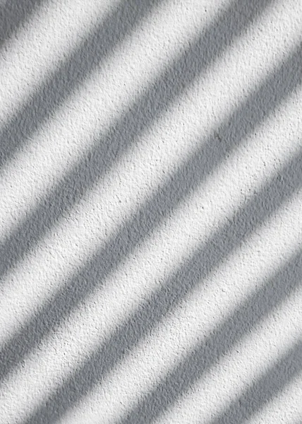 Abstract background of shadows on white wall