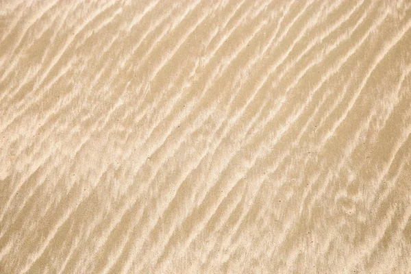 砂浜の砂のパターンの抽象的な背景 — ストック写真