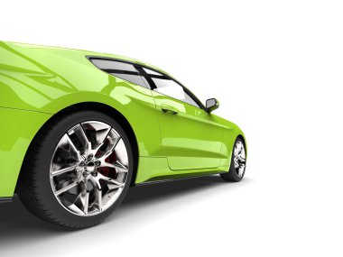 Çığlık atan yeşil modern süper kas araba - arka tekerlek portre vurdu