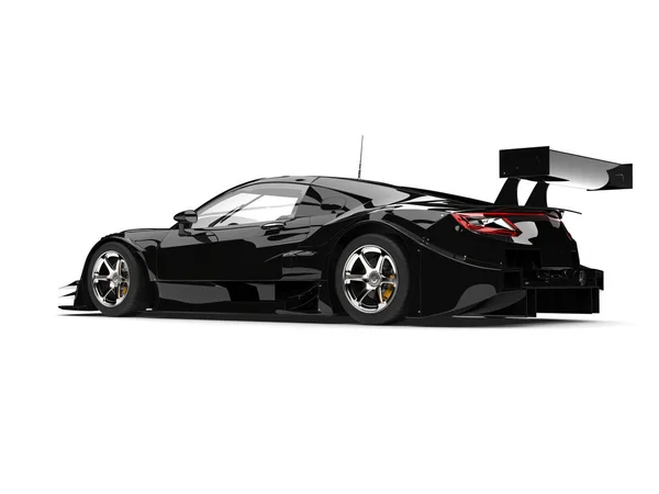 Cool black sports super car - beauty shot back view