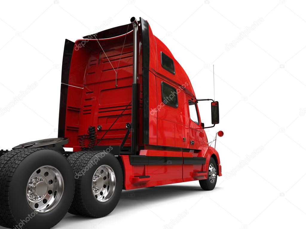 Big red modern semi - trailer truck - back view