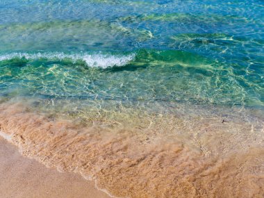 Güzel masmavi mavi su ve Portakal Plajı sands