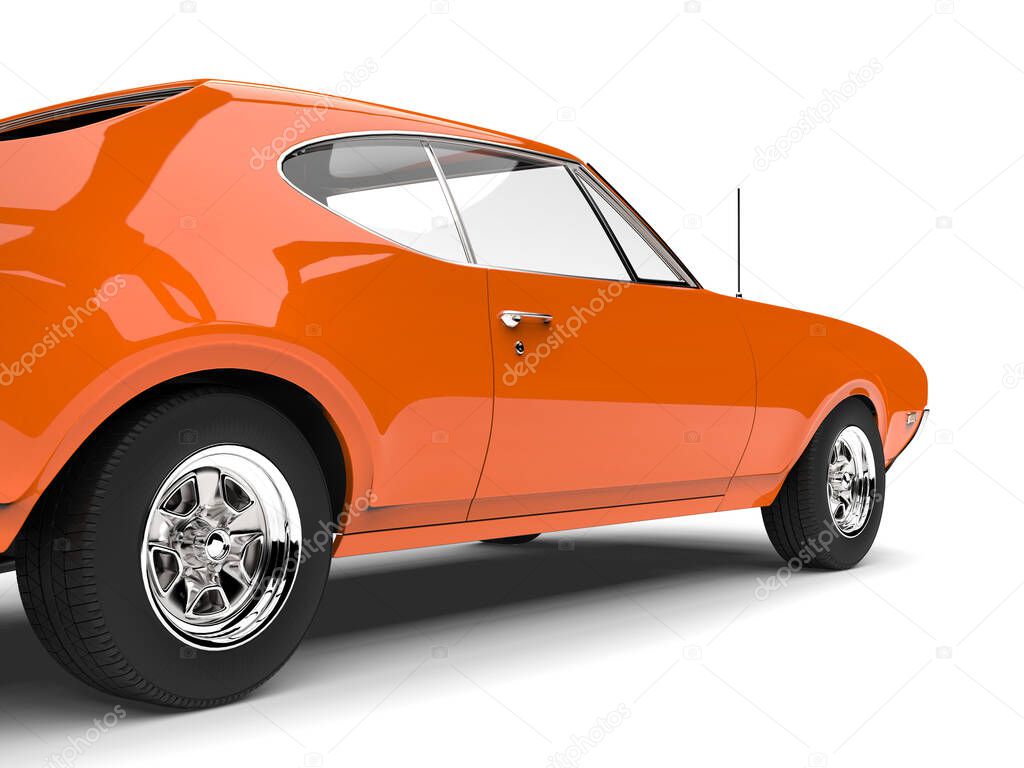 Bright tangerine orange old school muscle car - side shot