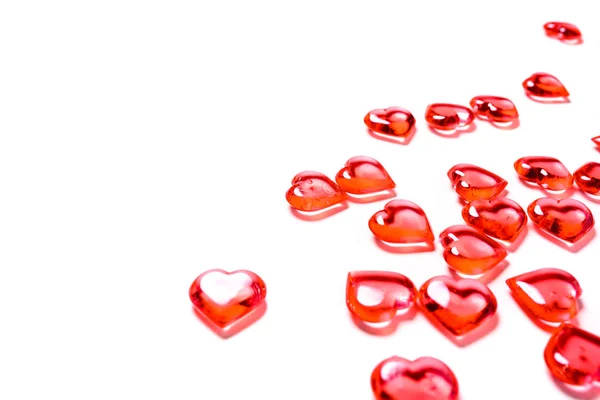 A group of red hearts on a white background with copy space. Valentines day theme. — Stock Photo, Image