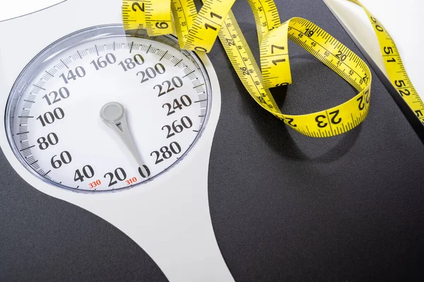 Human weight Dial measuring scale and measuring tape — Stock Photo, Image