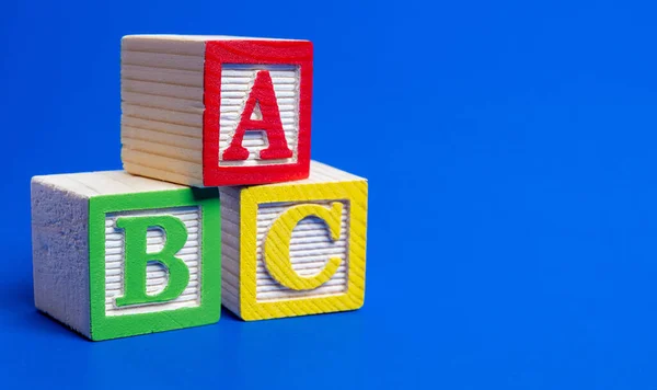 Set Wooden Abc Blocks Bright Blue Background — Stock Photo, Image