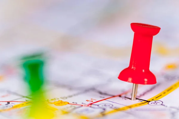 Colorful push pins on a map Stock Photo