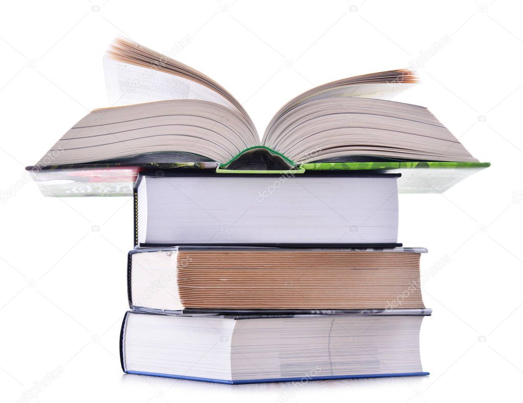 Composition with stack of books isolated on white.