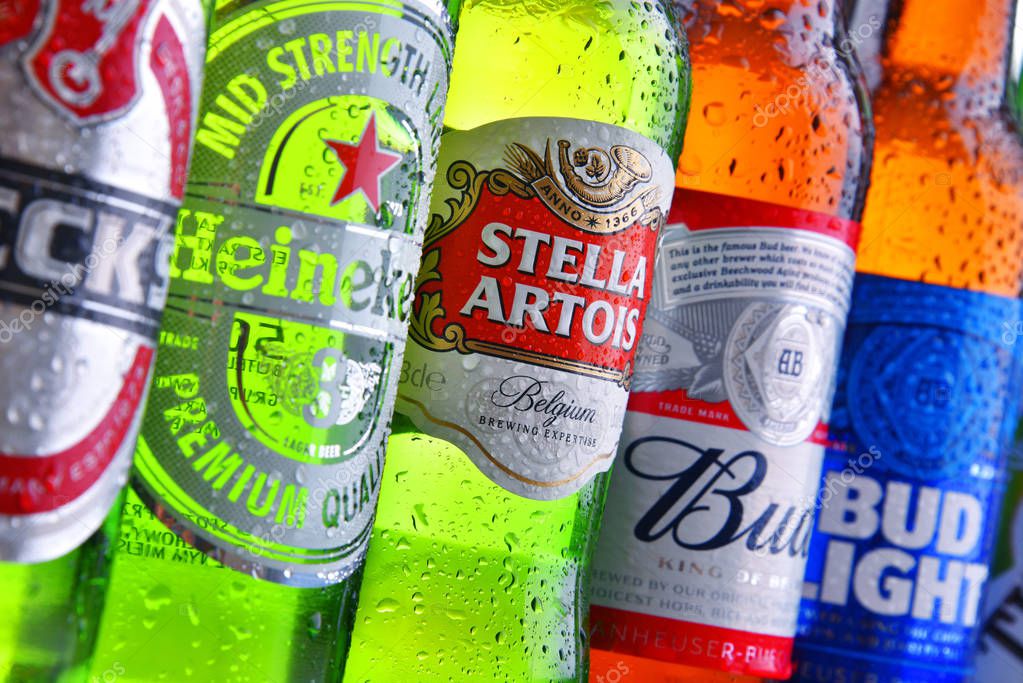 POZNAN, POL - JULY 19, 2018: Bottles of famous global beer brands including Heineken, Bud, Miller, Tuborg, Becks, Stella Artois, Peroni and San Miguel