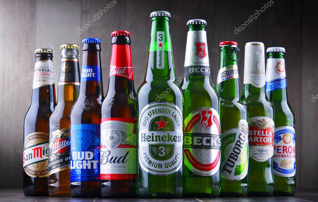 POZNAN, POL - JULY 19, 2018: Bottles of famous global beer brands including Heineken, Bud, Miller, Tuborg, Becks, Stella Artois, Peroni and San Miguel