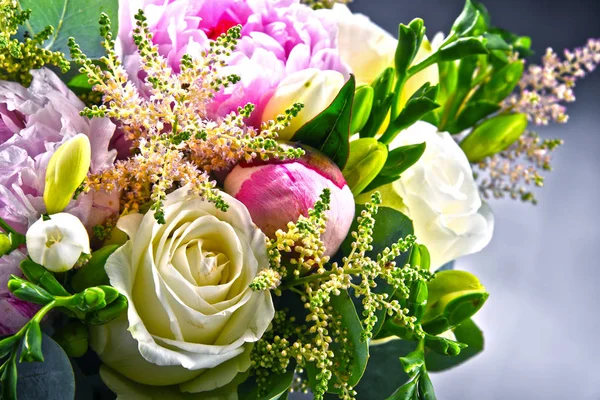 Composition with bouquet of freshly cut flowers.