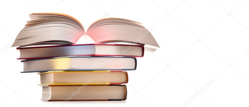 Composition with stack of books isolated on white.