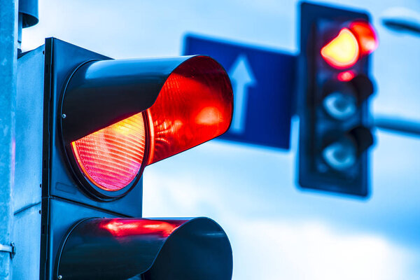 Traffic lights over urban intersection.