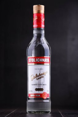POZNAN, POLAND - NOV 15, 2018: Bottle of Stolichnaya, popular brand of Russian vodka made of wheat and rye grain clipart